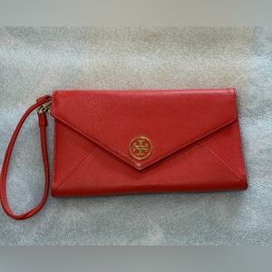 Tory Burch signature orange Wristlet Clutch